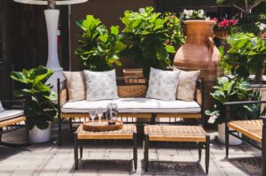 Comfortable outdoor living space with furniture on a patio and plants