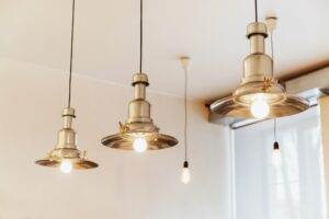 Loft style lighting decor in coffee shop.