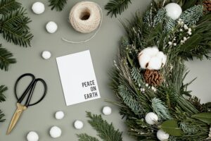 Top view of traditional handmade diy Christmas wreath made with natural elements